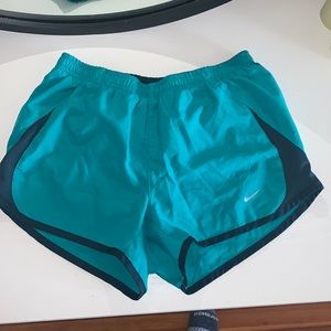 Turquoise Nike running shorts